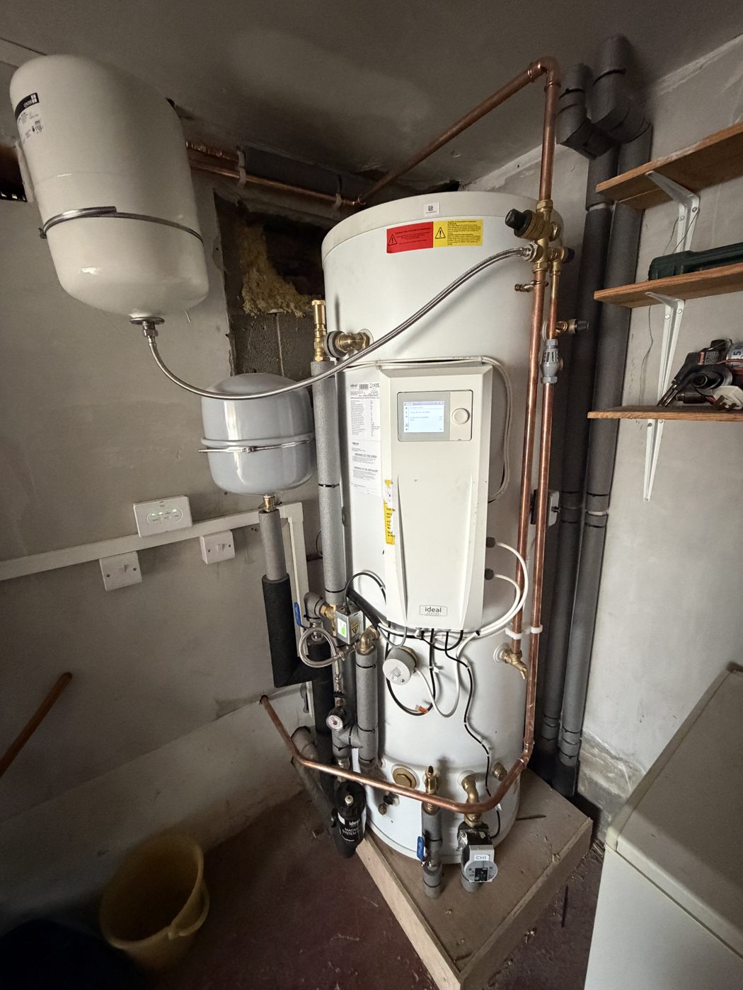 Air source heat pump hot water cylinder and pipework installation