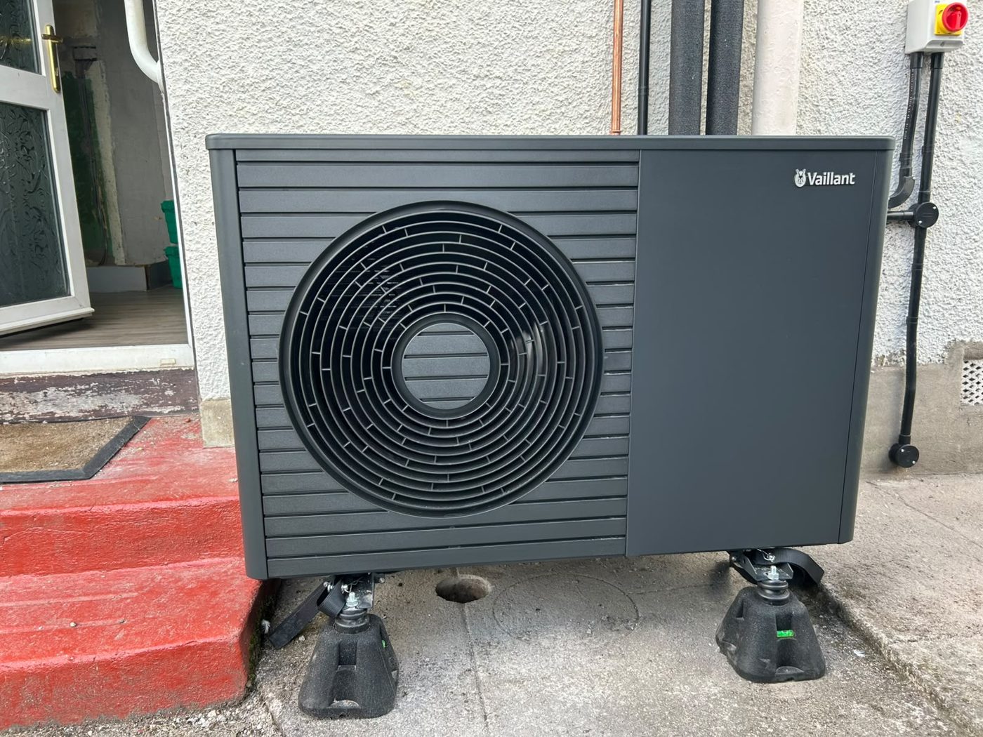 Vaillant air source heat pump installed outside a home in Edinburgh